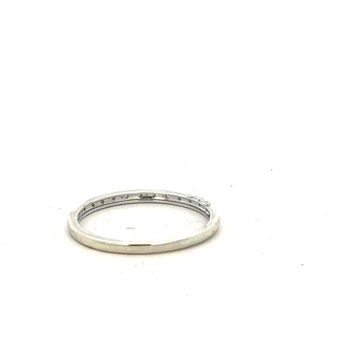 9ct white gold diamond ring in size S with sparkling diamonds, elegant jewelry piece with a sleek band design.
