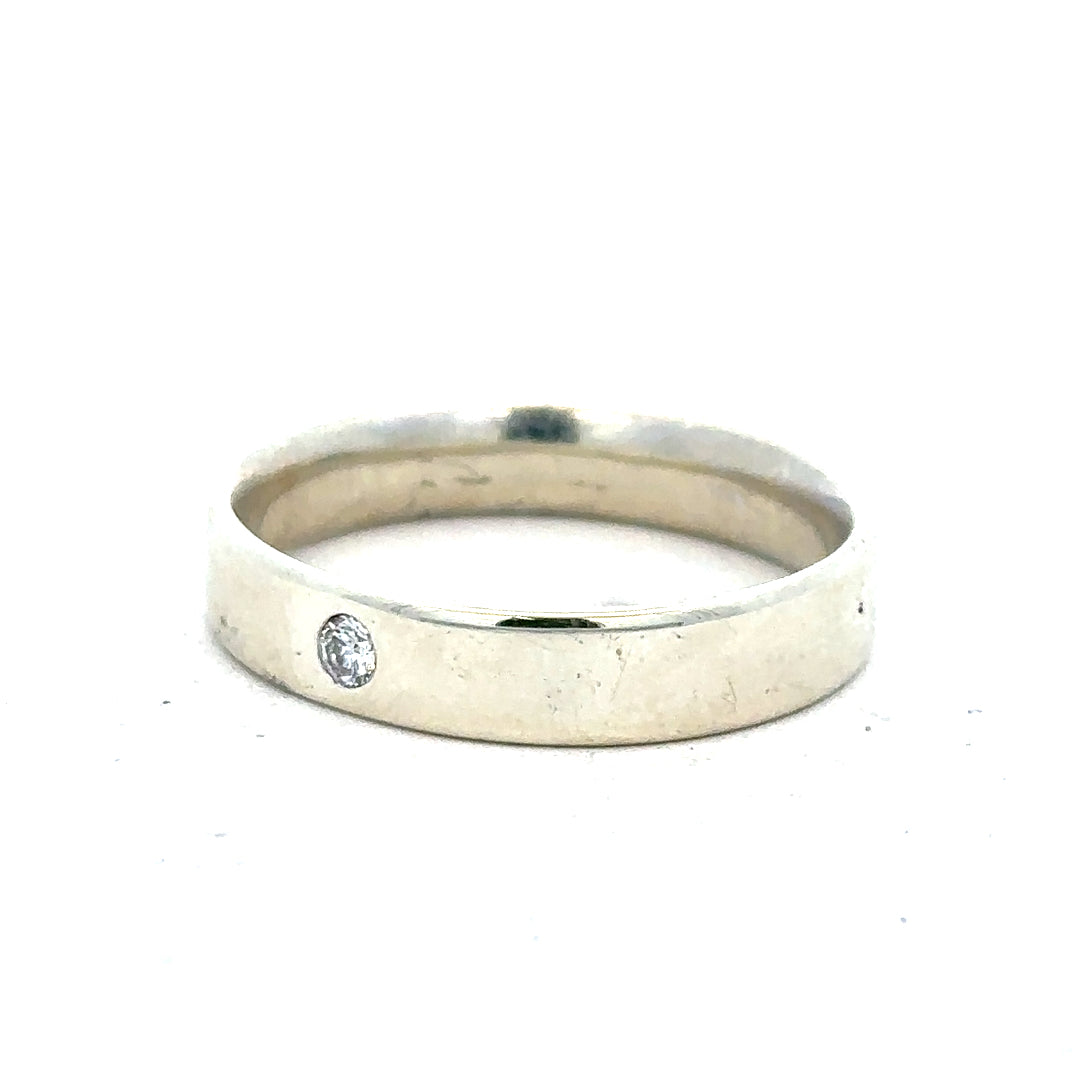 9ct white gold diamond ring in size V with sparkling diamonds, featuring a sleek and elegant design.