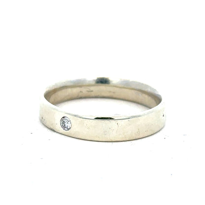 9ct white gold diamond ring in size V with sparkling diamonds, featuring a sleek and elegant design.