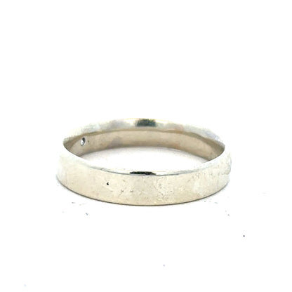 9ct white gold diamond ring in size V, featuring a sparkling diamond centerpiece and a sleek, polished band.
