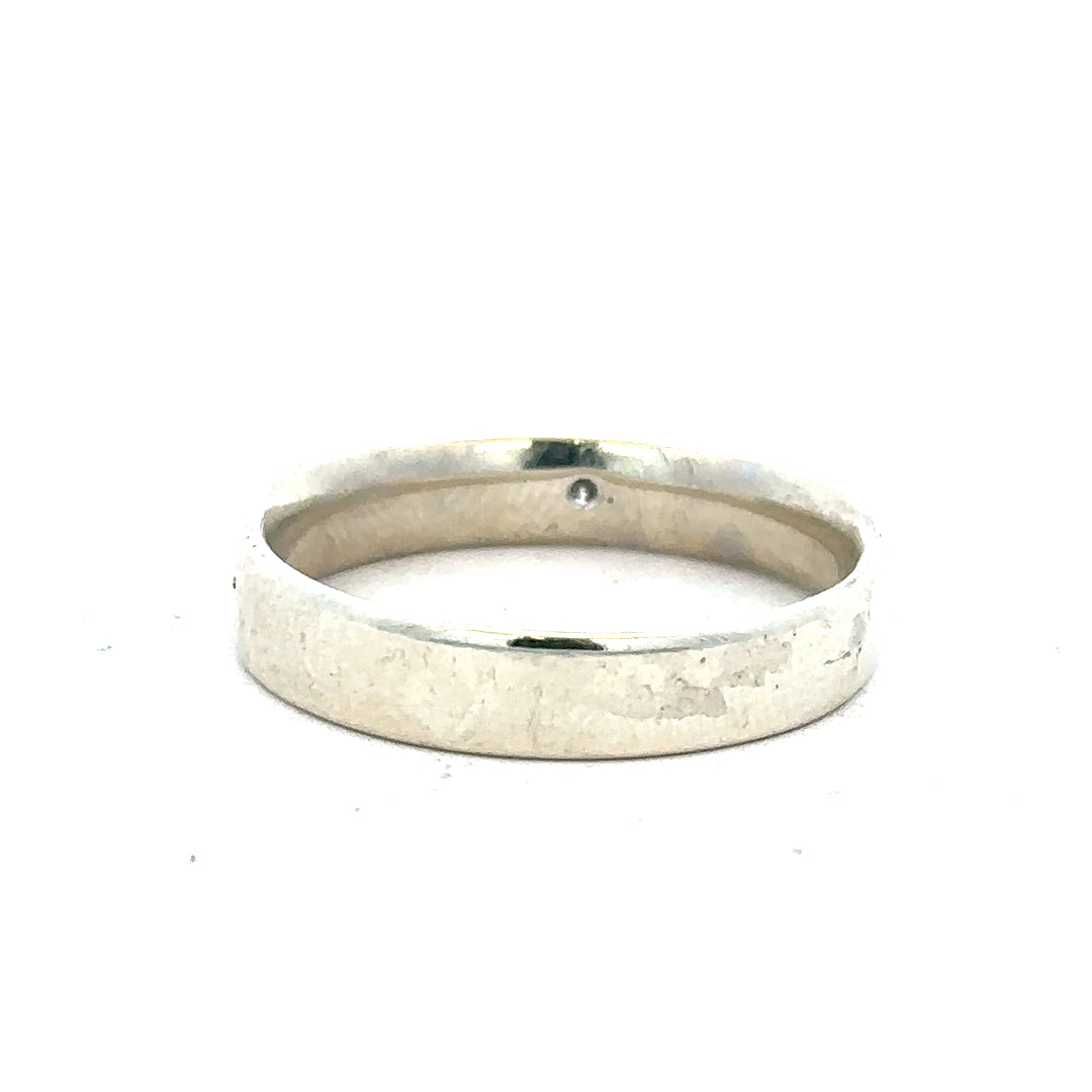 9ct white gold diamond ring in size V with sparkling diamonds, unbranded jewelry piece with elegant design.