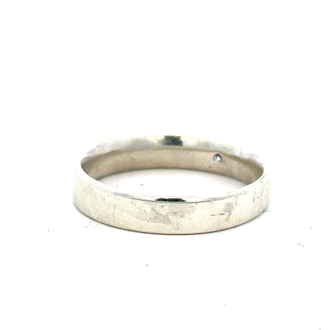 9ct white gold diamond ring in size V featuring a sparkling diamond, unbranded jewelry shown in a close-up shot.
