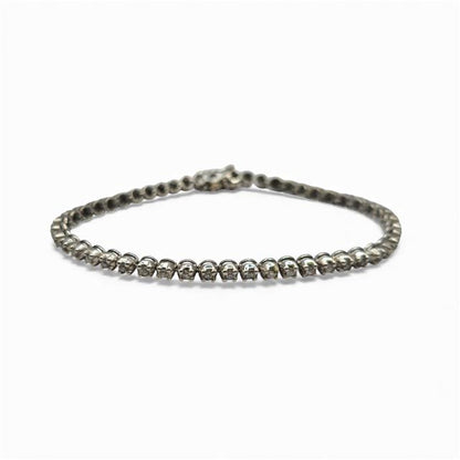 9ct white gold diamond tennis bracelet with sparkling diamonds, showcasing elegant craftsmanship and a sleek design.
