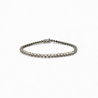 9ct white gold diamond tennis bracelet with sparkling round-cut diamonds on an elegant unbranded jewelry bracelet.