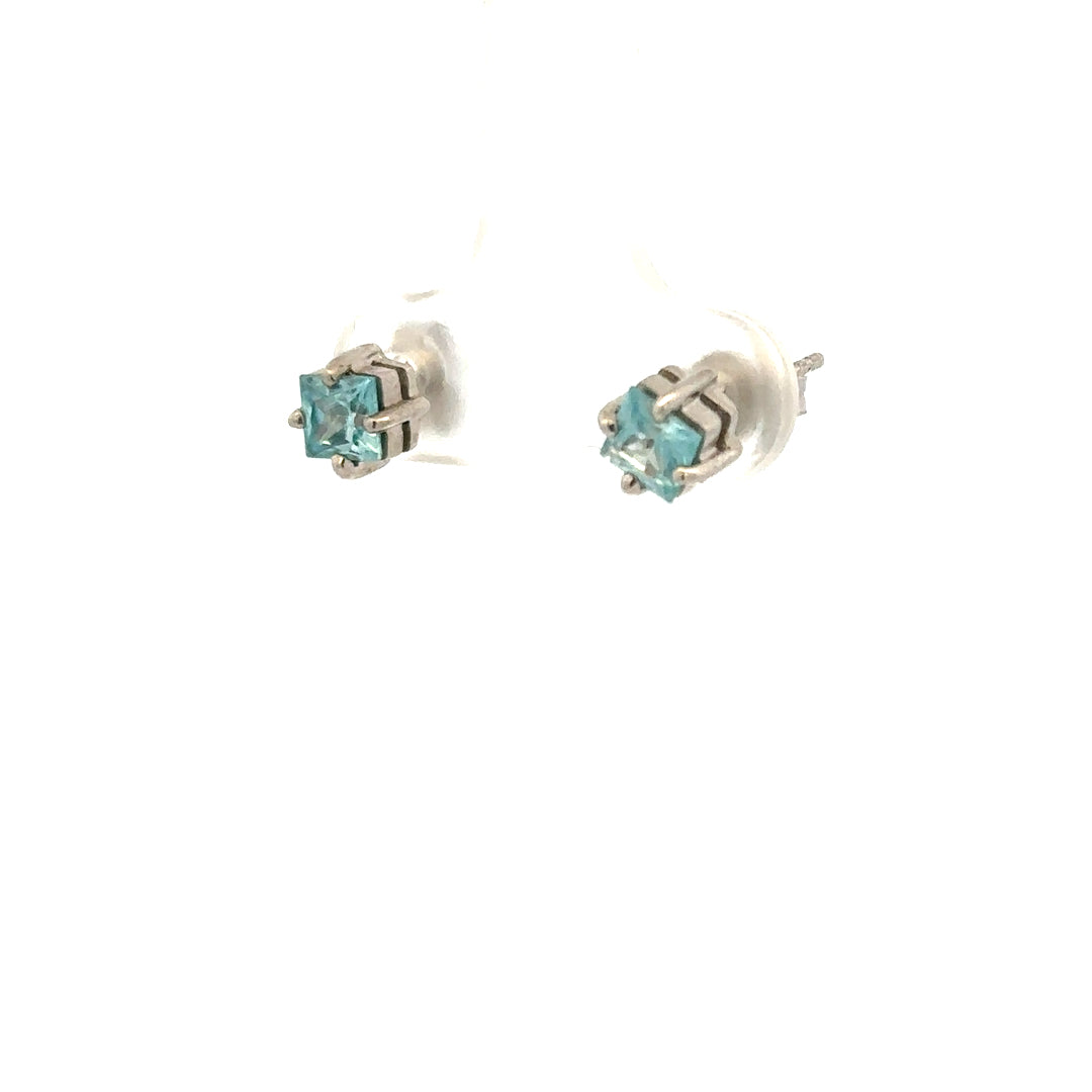 9ct white gold earrings weighing 1.3g, displayed on a plain background, showcasing elegant jewelry design.