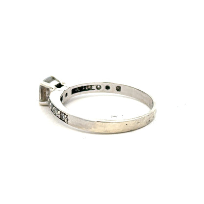9ct white gold mossainte ring in size R, close-up view highlighting the delicate band and mossainte gemstone detail.