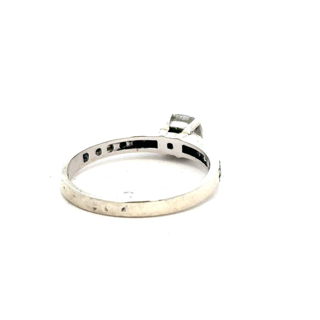 9ct white gold mossainte ring in size R, showcasing a delicate design with polished finish and intricate mossainte gemstone setting.