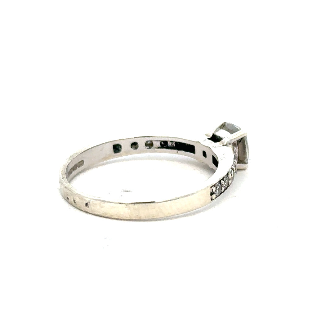 9ct white gold mossainte ring in size R, featuring intricate mossainte gemstone setting, unbranded jewelry piece.
