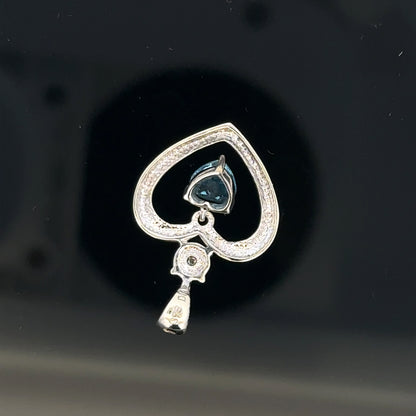 9ct white gold pendant weighing 1.2g, unbranded jewelry piece with intricate design, displayed on a neutral background.