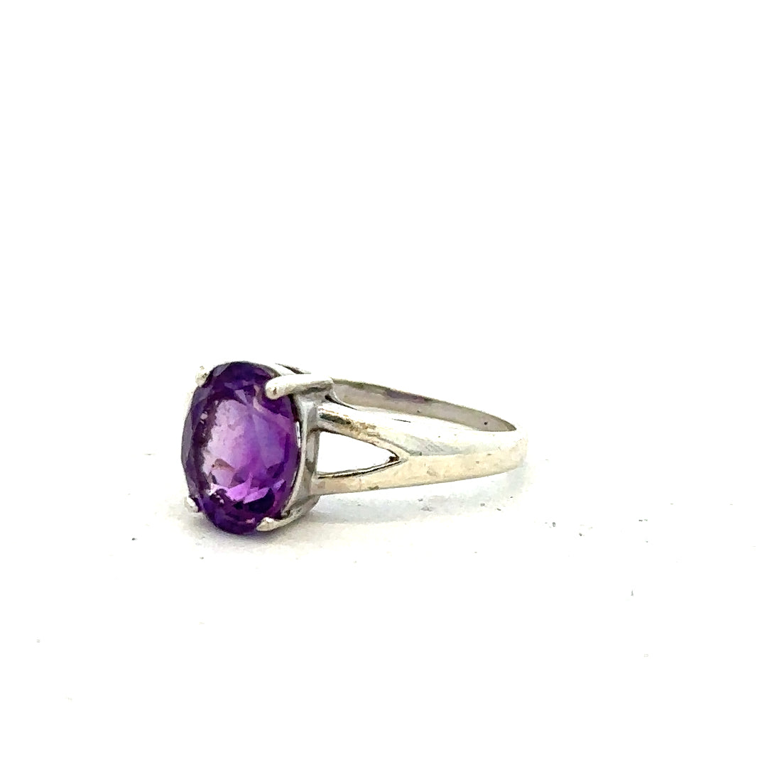 9ct white gold ring in size K with a smooth polished finish, featuring a simple elegant band design.