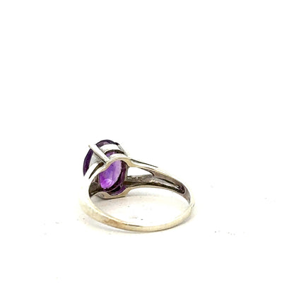 9ct white gold ring in size K with a smooth band, unbranded jewelry, showcasing a sleek and elegant design.