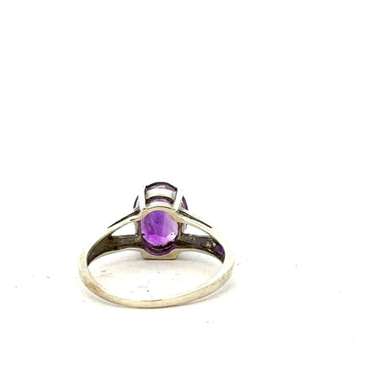 9ct white gold ring size K with a smooth band, unbranded, showcasing elegant jewelry design.