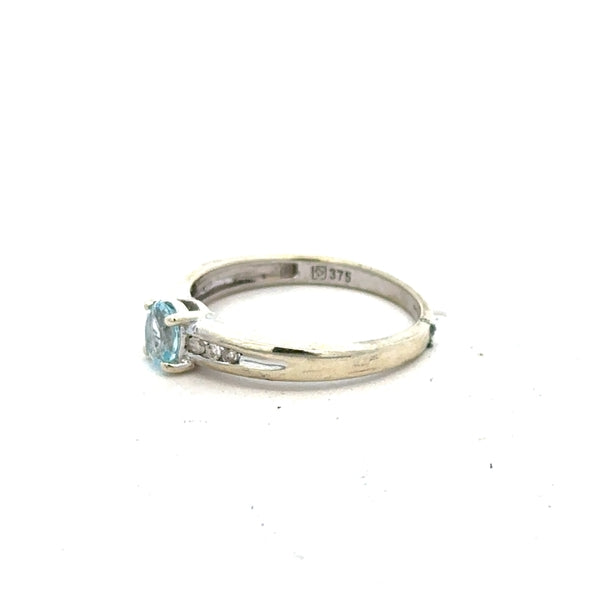9ct white gold ring in size L with a smooth band, unbranded jewelry, showcasing a sleek and elegant design.