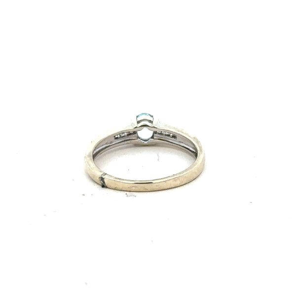 9ct white gold ring in size L with a sleek, polished finish, showcasing its elegant design and craftsmanship.