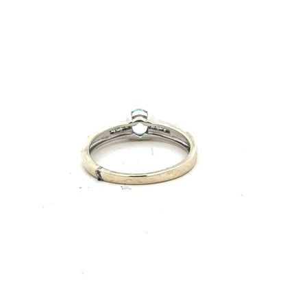 9ct white gold ring in size L with a sleek, polished finish, showcasing its elegant design and craftsmanship.