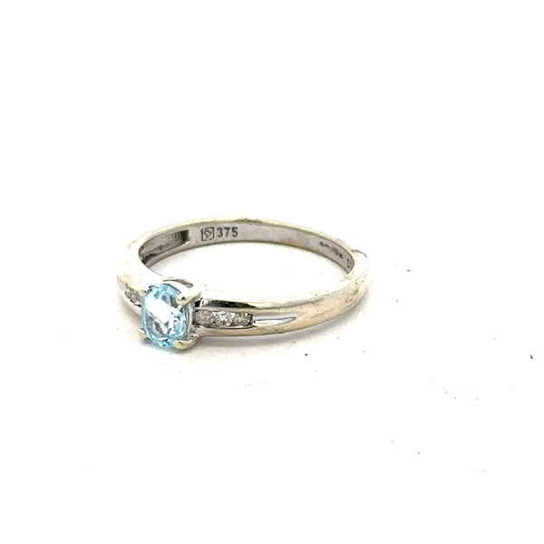 9ct white gold ring in size L with a smooth band, unbranded jewelry piece showcasing elegant craftsmanship.