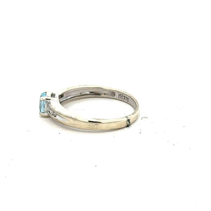 9ct white gold ring in size L with a smooth polished finish, unbranded jewelry showcasing elegant craftsmanship.