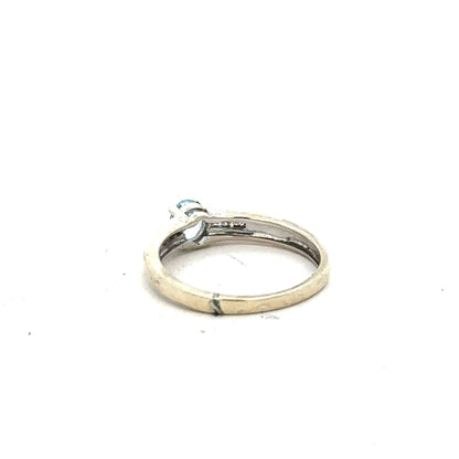 9ct white gold ring in size L with a sleek, polished finish, featuring a classic band design.