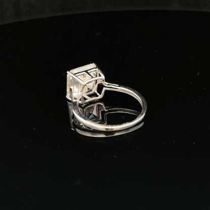 9ct white gold ring in size L with a smooth band, unbranded jewelry piece showcasing elegant craftsmanship.