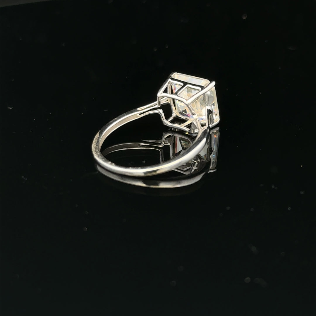 9ct white gold ring in size L with a smooth polished band, unbranded jewelry accessory.