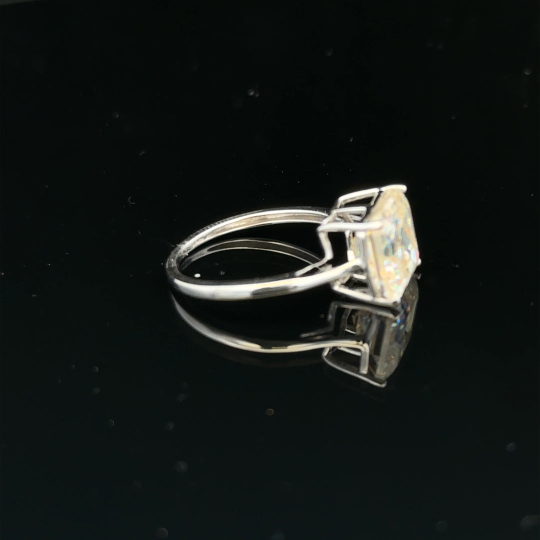 9ct white gold ring in size L with a smooth band, unbranded jewelry piece displayed on a neutral background.