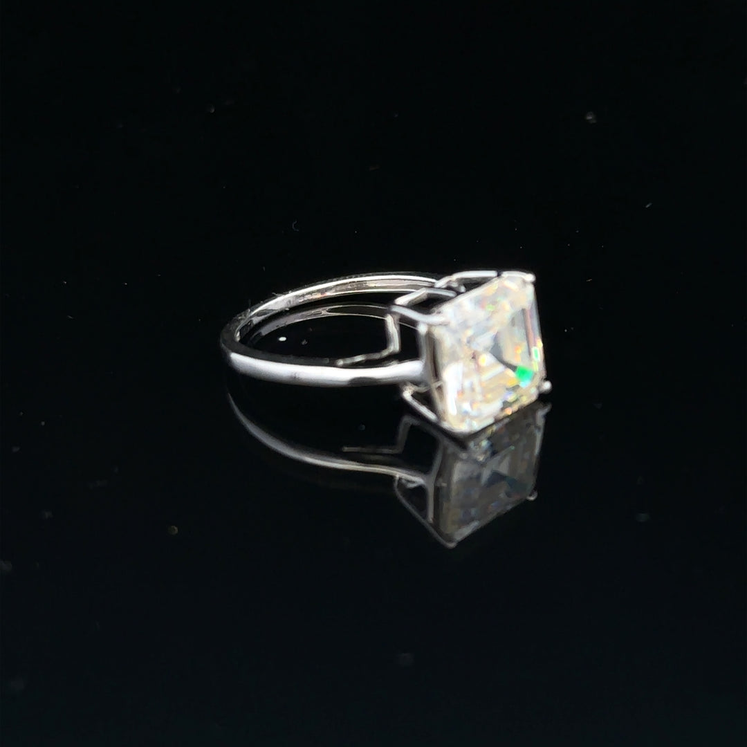 9ct white gold ring in size L with a simple, elegant band, unbranded, showcasing a smooth and polished finish.