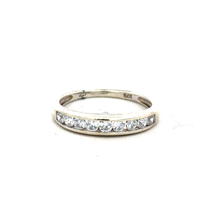 9ct white gold ring in size L featuring a simple, elegant design with a polished finish.