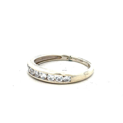 9ct white gold ring in size L with a sleek design, showcasing its elegant band and shiny finish.