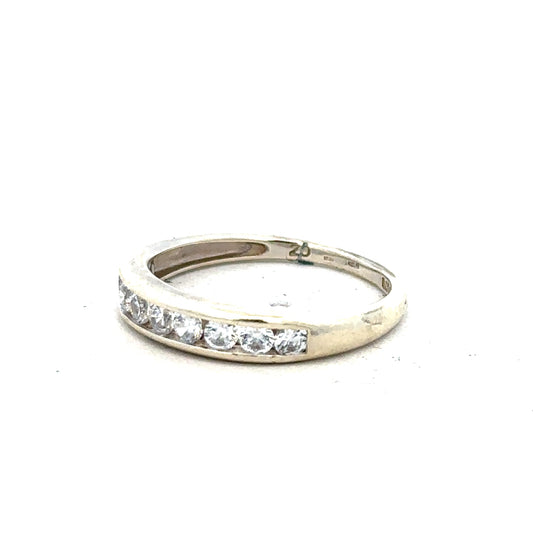 9ct white gold ring in size L with a sleek design, showcasing its elegant band and shiny finish.