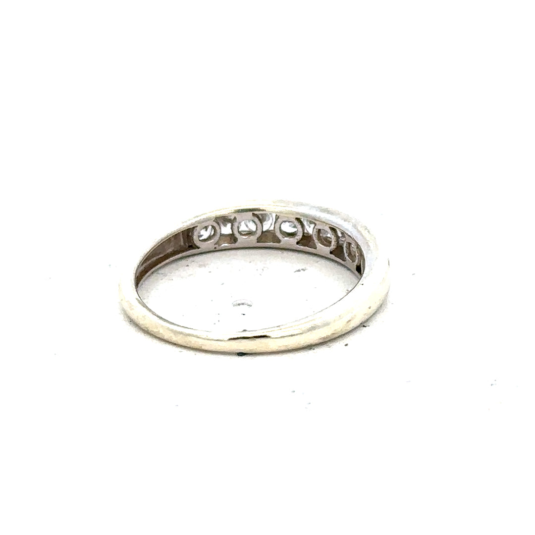 9ct white gold ring in size L with a sleek, polished finish, featuring a simple, elegant band design.