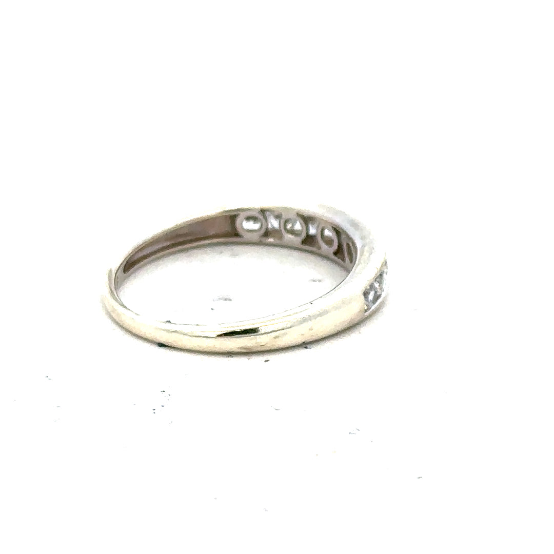 9ct white gold ring size L with a smooth band, unbranded jewelry accessory, showcasing polished finish and elegant design.