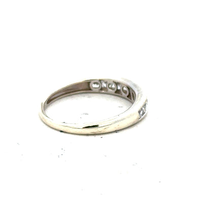 9ct white gold ring size L with a smooth band, unbranded jewelry accessory, showcasing polished finish and elegant design.