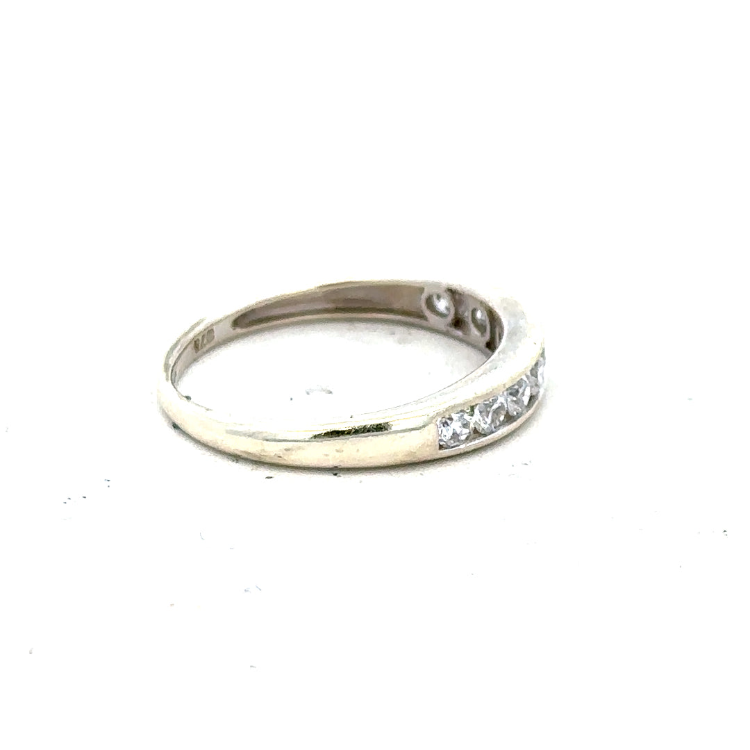 9ct white gold ring size L with a smooth band, unbranded, displayed on a neutral background.