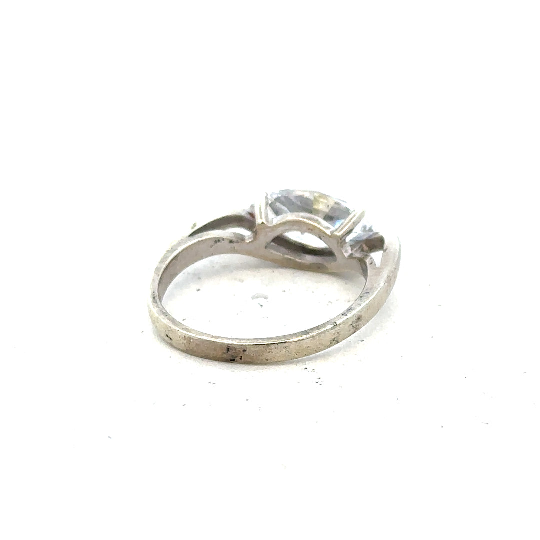 9ct white gold ring in size O with a smooth band, unbranded jewelry, shown from a front view.
