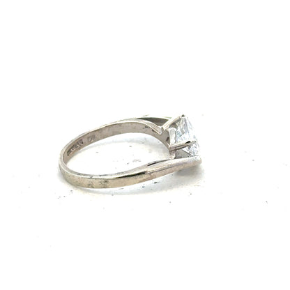 9ct white gold ring in size O with a smooth band, unbranded jewelry piece displayed on a plain background.
