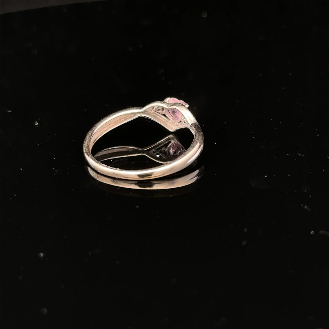 9ct white gold ring in size O with a smooth band, unbranded jewelry piece displayed on a plain background.