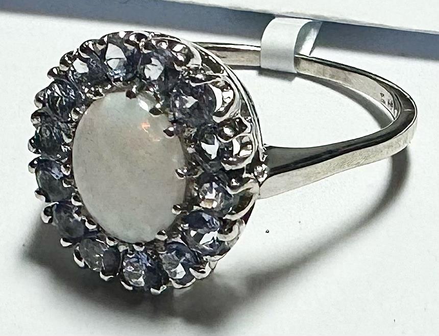 9ct white gold ring in size S with a smooth band, unbranded jewelry, displayed on a neutral background.