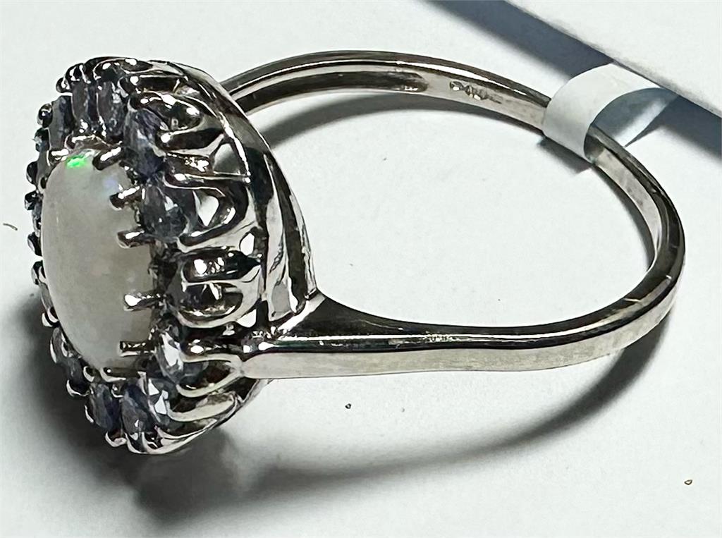 9ct white gold ring in size S, featuring a simple, elegant band with a polished finish.