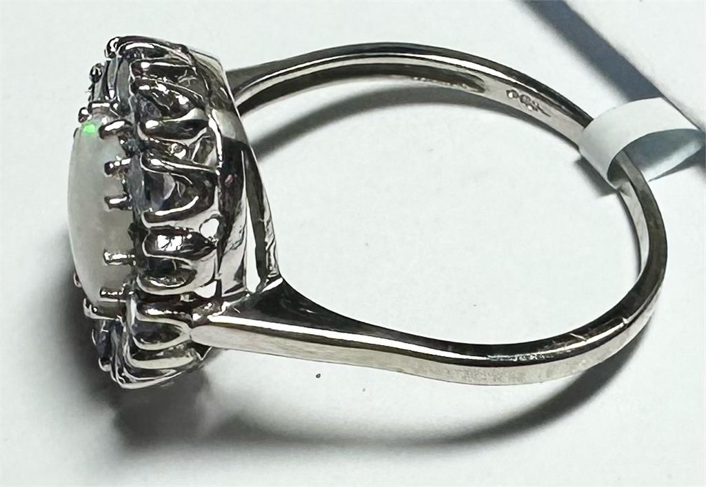 9ct white gold ring size S with a smooth polished finish, unbranded jewelry showcasing elegant craftsmanship.