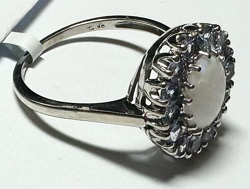 9ct white gold ring in size S with a simple, elegant band, showcasing a sleek and polished design.