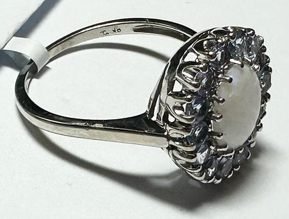 9ct white gold ring in size S with a simple, elegant band, showcasing a sleek and polished design.