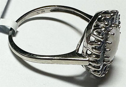 9ct white gold ring in size S with a sleek, polished finish, showcasing elegant craftsmanship and classic jewelry style.