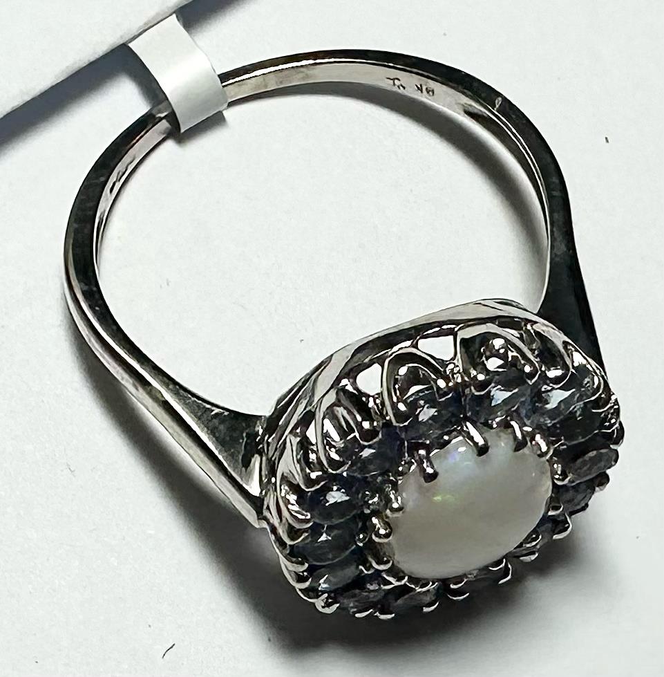 9ct white gold ring size S with a smooth band, unbranded jewelry piece displayed on a neutral background.