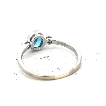 9ct white gold ring featuring a topaz gemstone and diamond accents, size Q, unbranded jewelry.