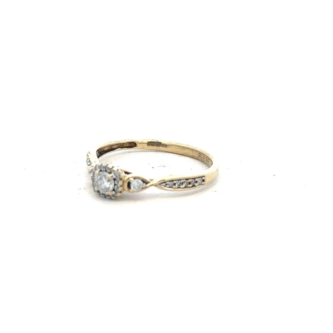 9ct yellow gold diamond ring with 0.33 carats, size S, featuring a sparkling central diamond and a polished gold band.