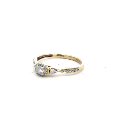 9ct yellow gold diamond ring with 0.33 carats, size S, featuring a sparkling central diamond and a polished gold band.