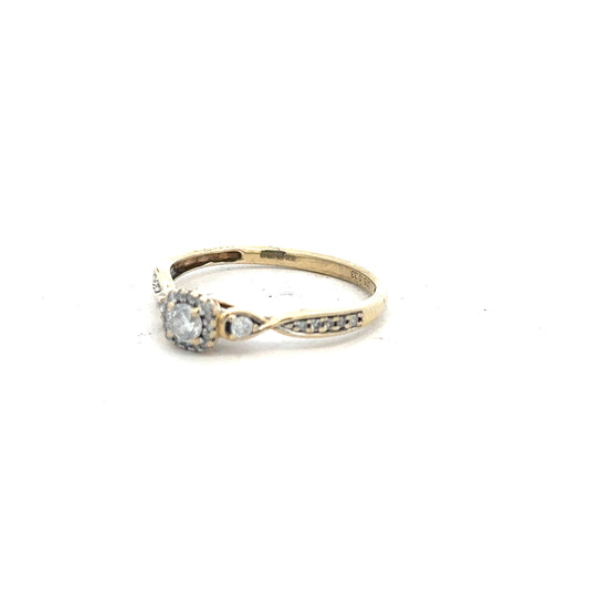 9ct yellow gold diamond ring with 0.33 carats, size S, featuring a sparkling central diamond and a polished gold band.