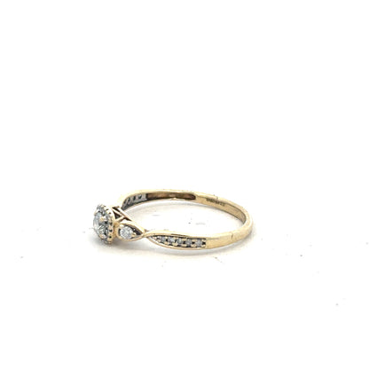9ct yellow gold diamond ring with 0.33 carats, size S, featuring a sparkling central diamond and elegant gold band.