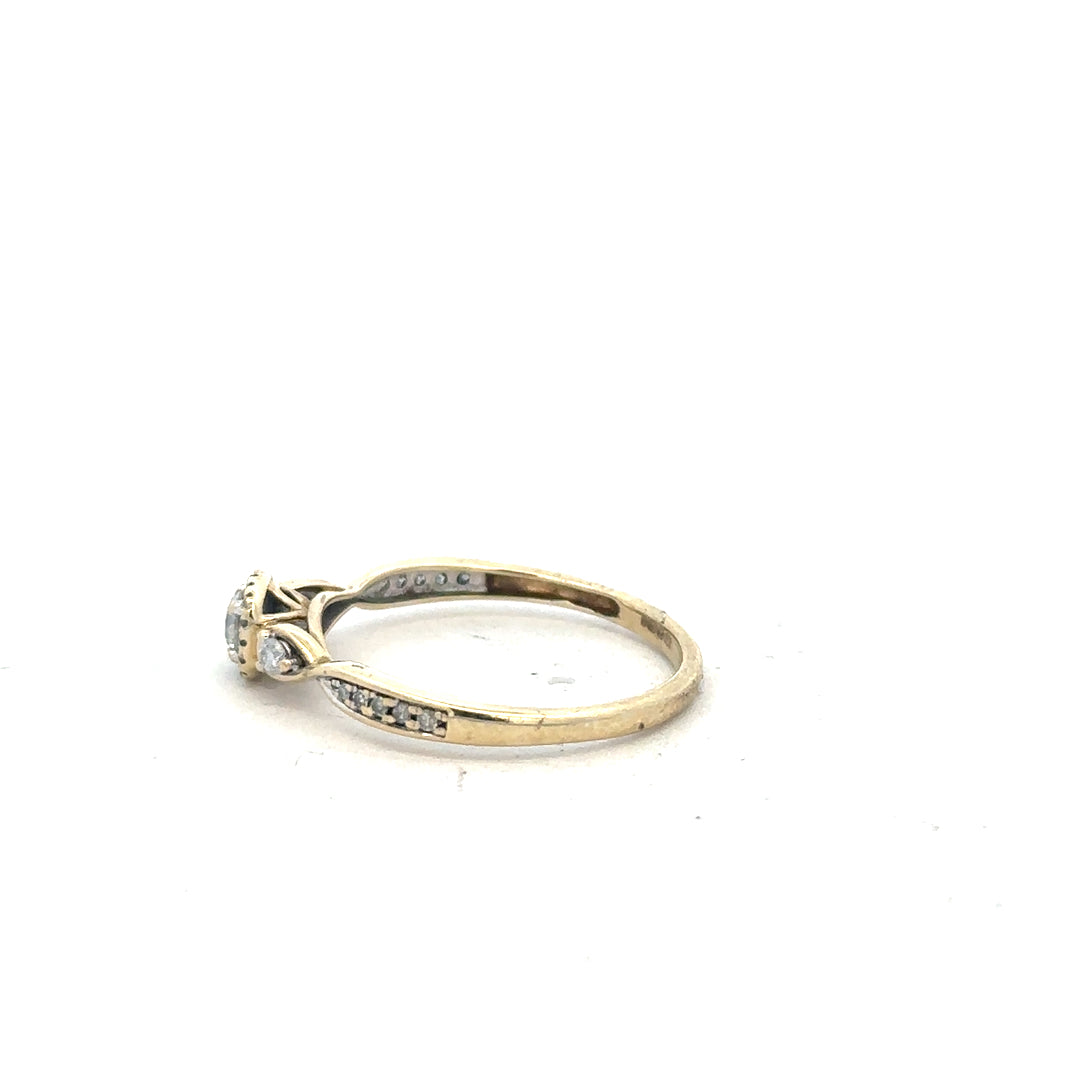 9ct yellow gold diamond ring with 0.33 carat stones, size S, featuring a sleek band and sparkling diamonds.