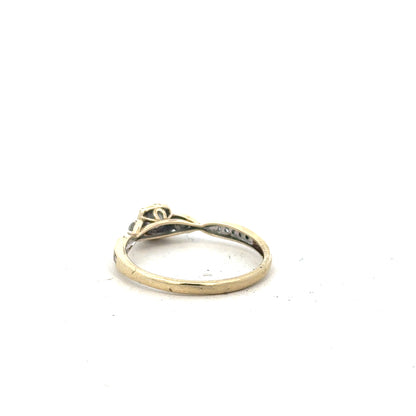 9ct yellow gold diamond ring with 0.33 carats of diamonds in size S, featuring a classic design and unbranded finish.